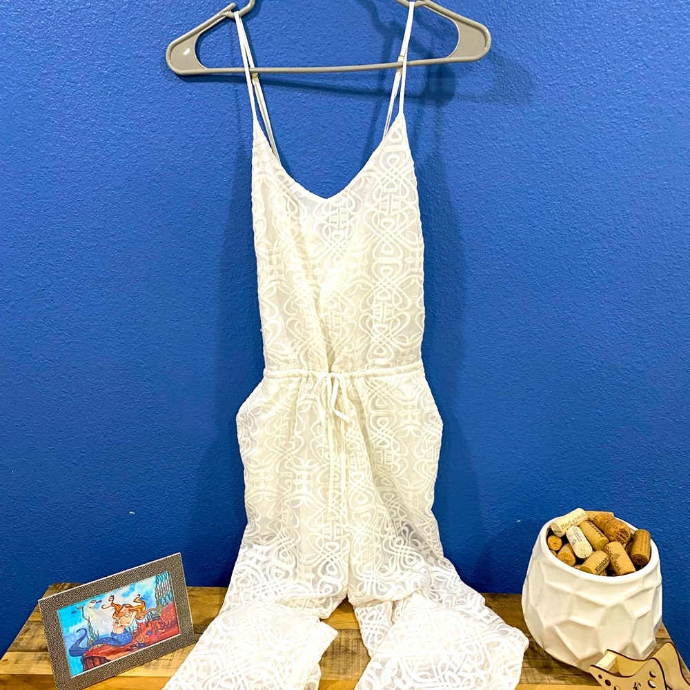 White jumpsuit- beach, poolside to cocktails